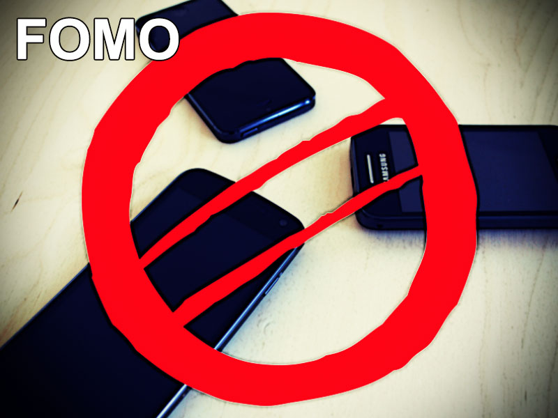 Verbotszeichen vor Smartphones