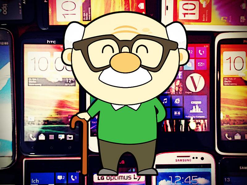 Cartoon-Opa vor Handywand